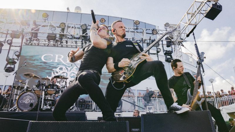 Creed perform 'With Arms Wide Open' together for the first time in 12 years on reunion cruise